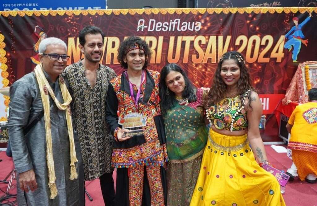 Garba dancers performing in colorful traditional outfits at A-Desiflava Navratri Utsav 2024 in Hong Kong