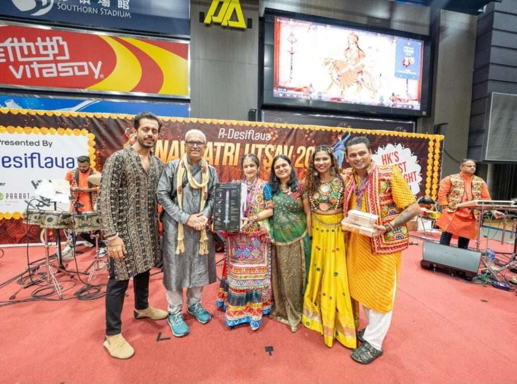 Garba dancers performing in colorful traditional outfits at A-Desiflava Navratri Utsav 2024 in Hong Kong